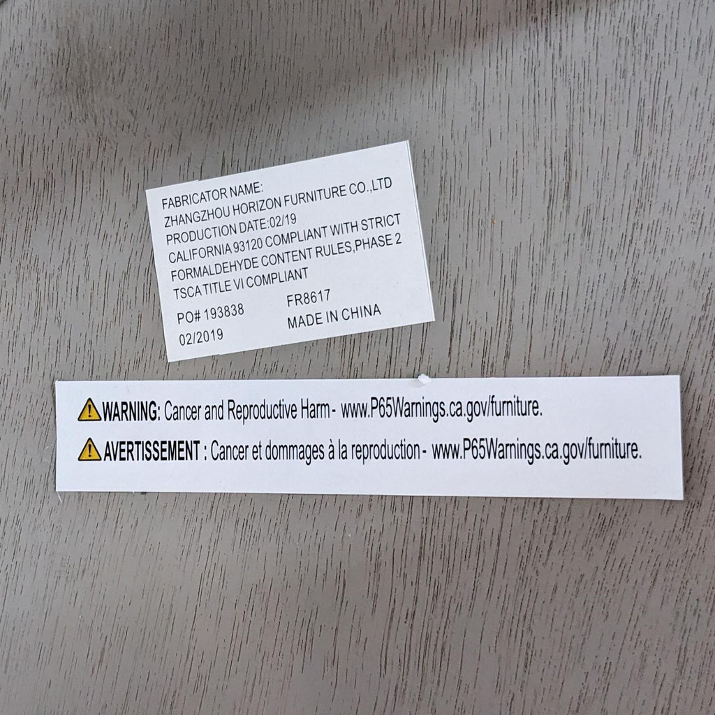 Label shows production info and safety warnings for the Reperch end table.