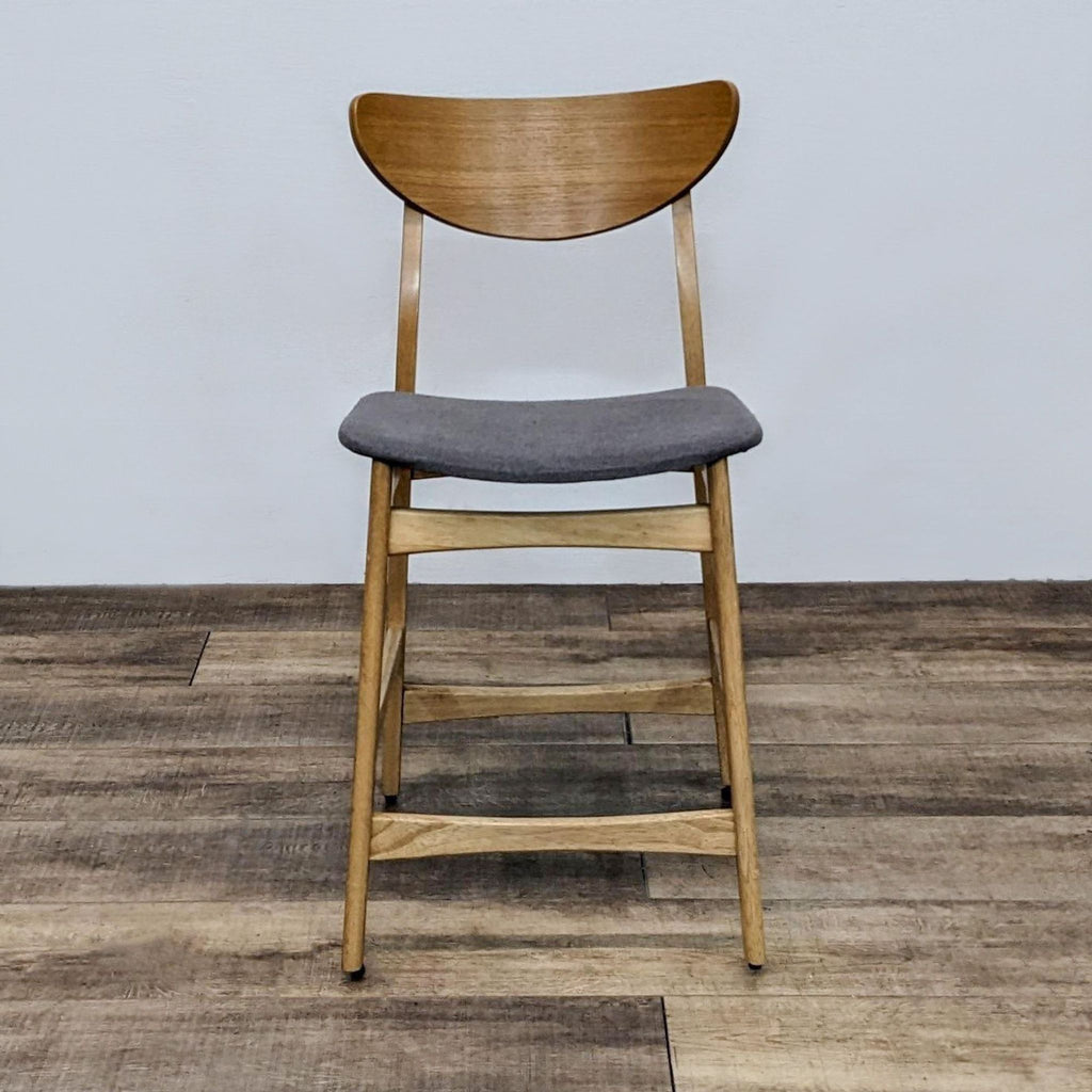 a set of four chairs by [ unused0 ]