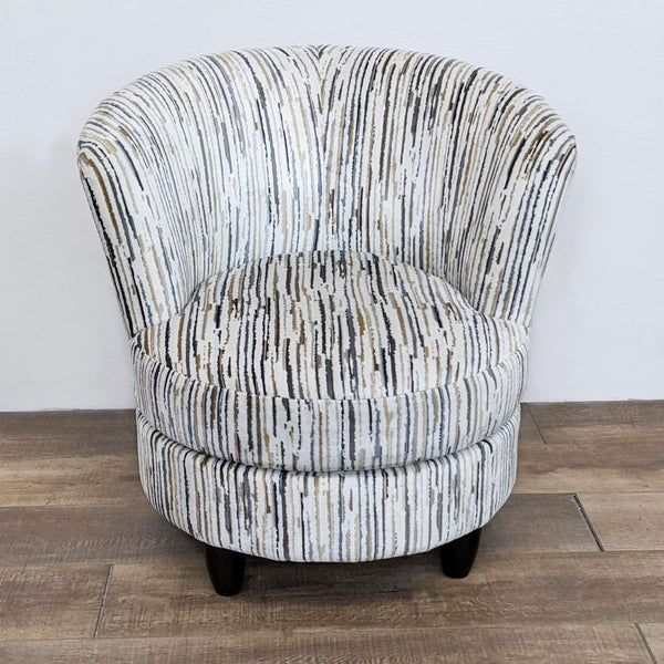 Front view of the Apollo chair by Living Spaces with a curved back and striped pattern.
