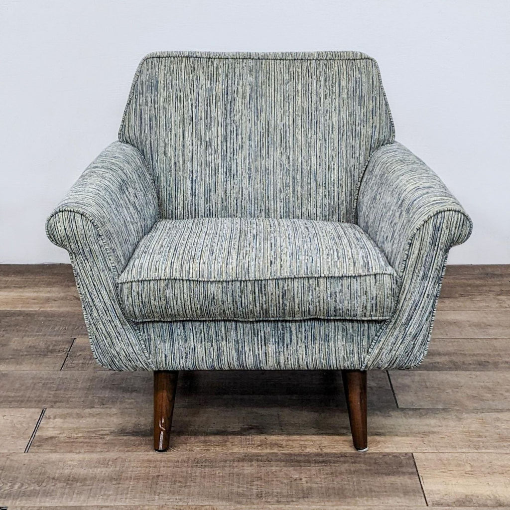 Front view of the Patterson III chair with rolled arms and wood legs. 