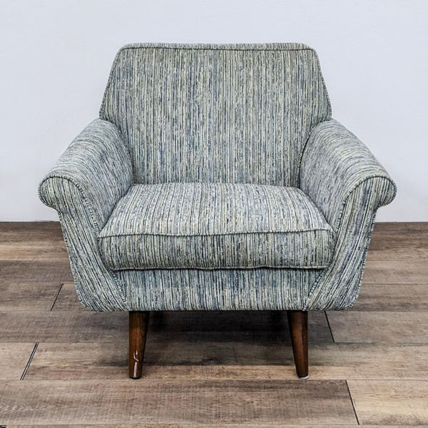 Front view of the Patterson III chair with rolled arms and wood legs. 