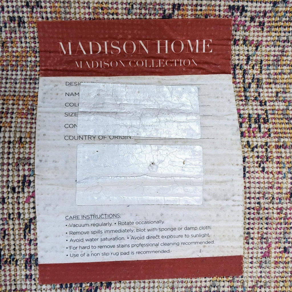 Label showing care instructions for the Madison Home floral rug.