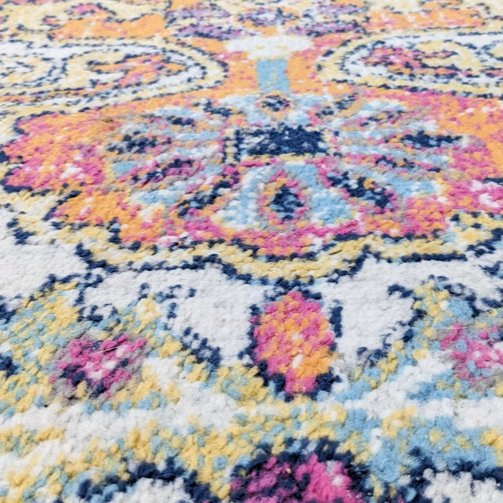 a close up of a persian rug.