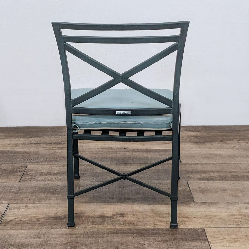 Neoclassical aluminum chair with blue cushion by Brown Jordan.