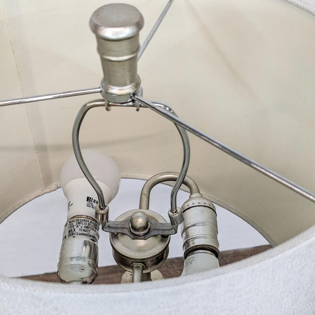 Close-up of the Reperch lamp's bulb fittings and structure inside the shade.