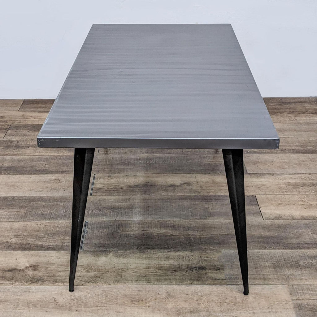 Top view of Lumisource Austin dining table, featuring a sleek metal finish.