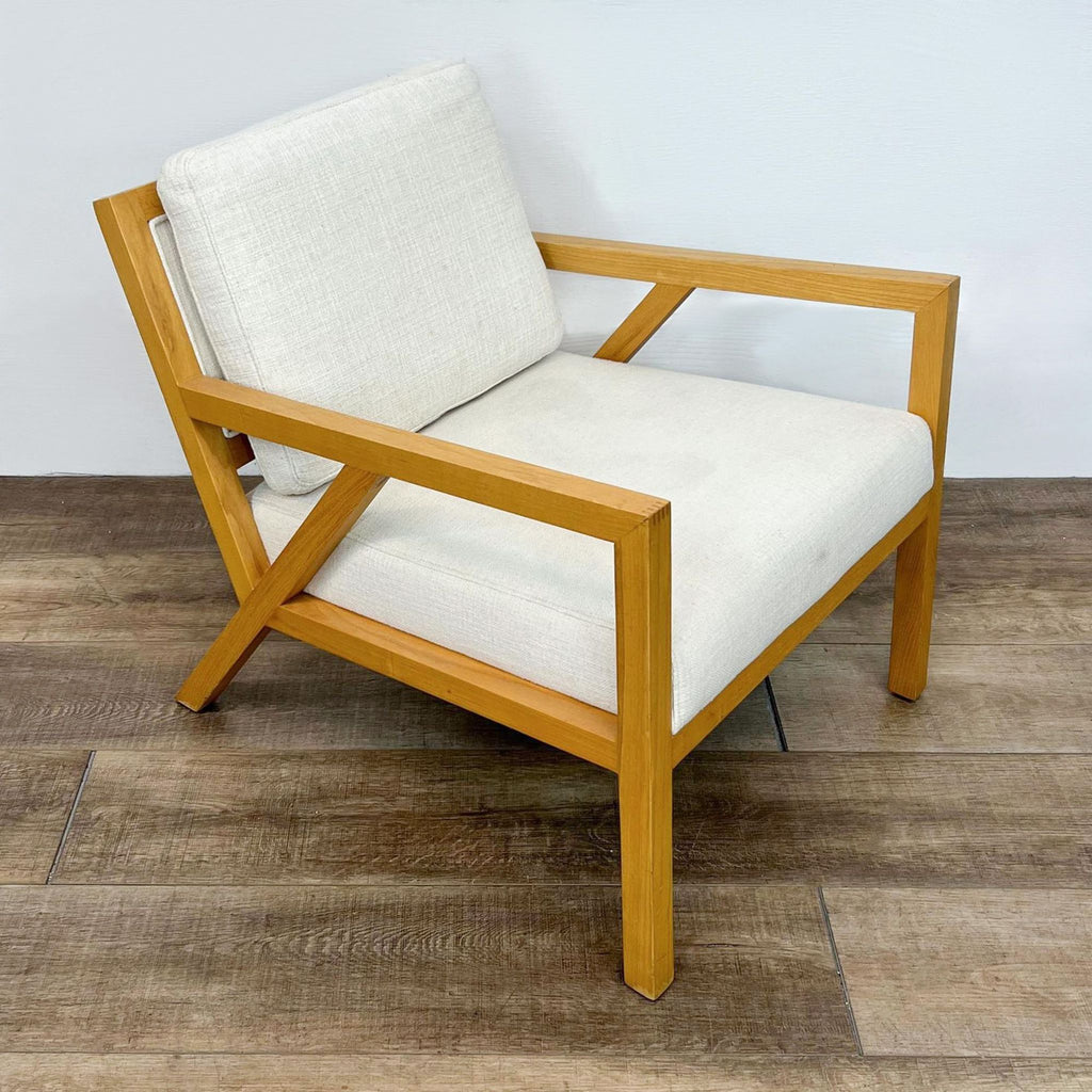 Mid-century modern chair, solid wood frame, white cushions, by Guss Modern.