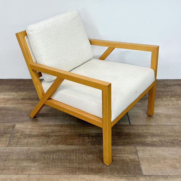 Mid-century modern chair, solid wood frame, white cushions, by Guss Modern.