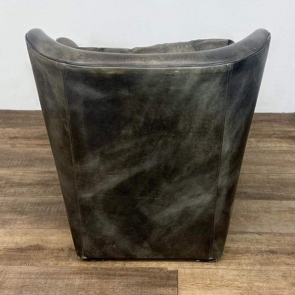 Back view of Restoration Hardware leather swivel chair.