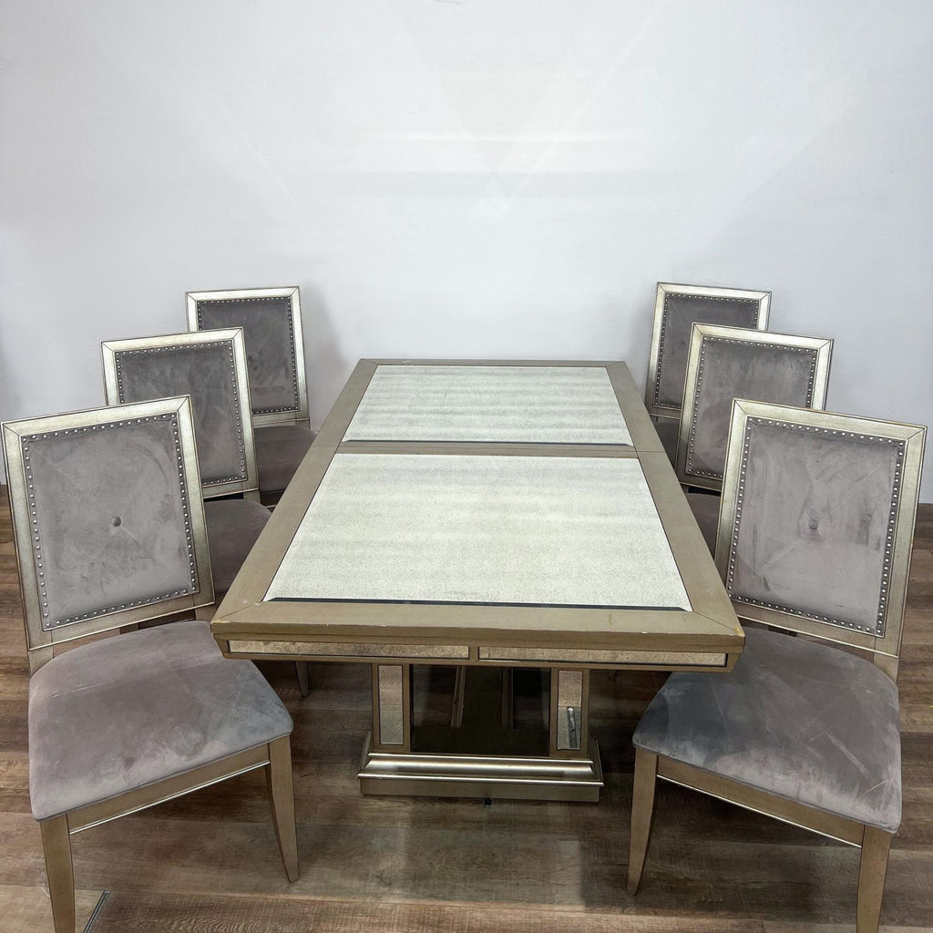 Elegant dining set includes an expandable table with mirrored sides and six velvet-upholstered chairs.