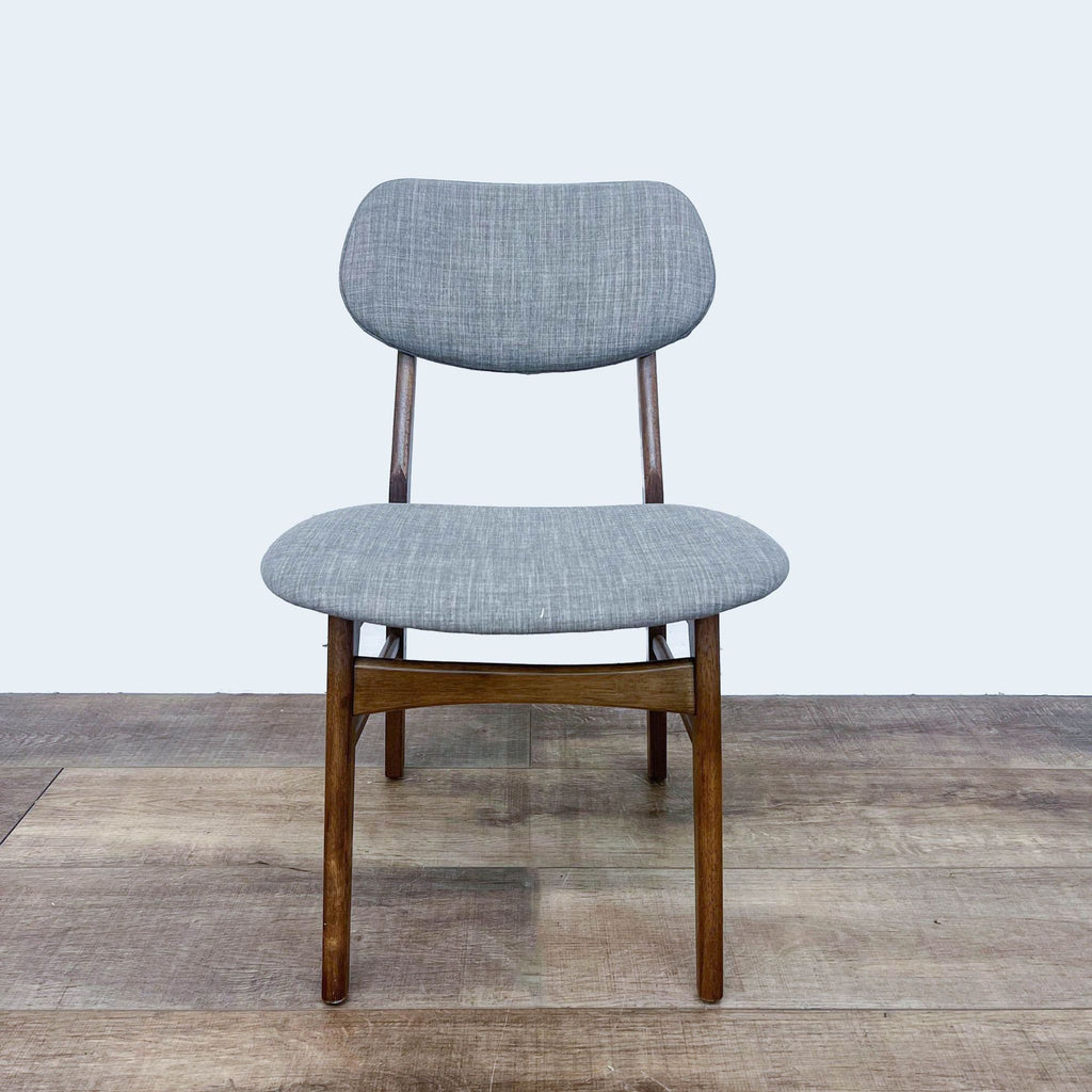 Midtown dining chair by Zuo Modern in gray fabric, front view.