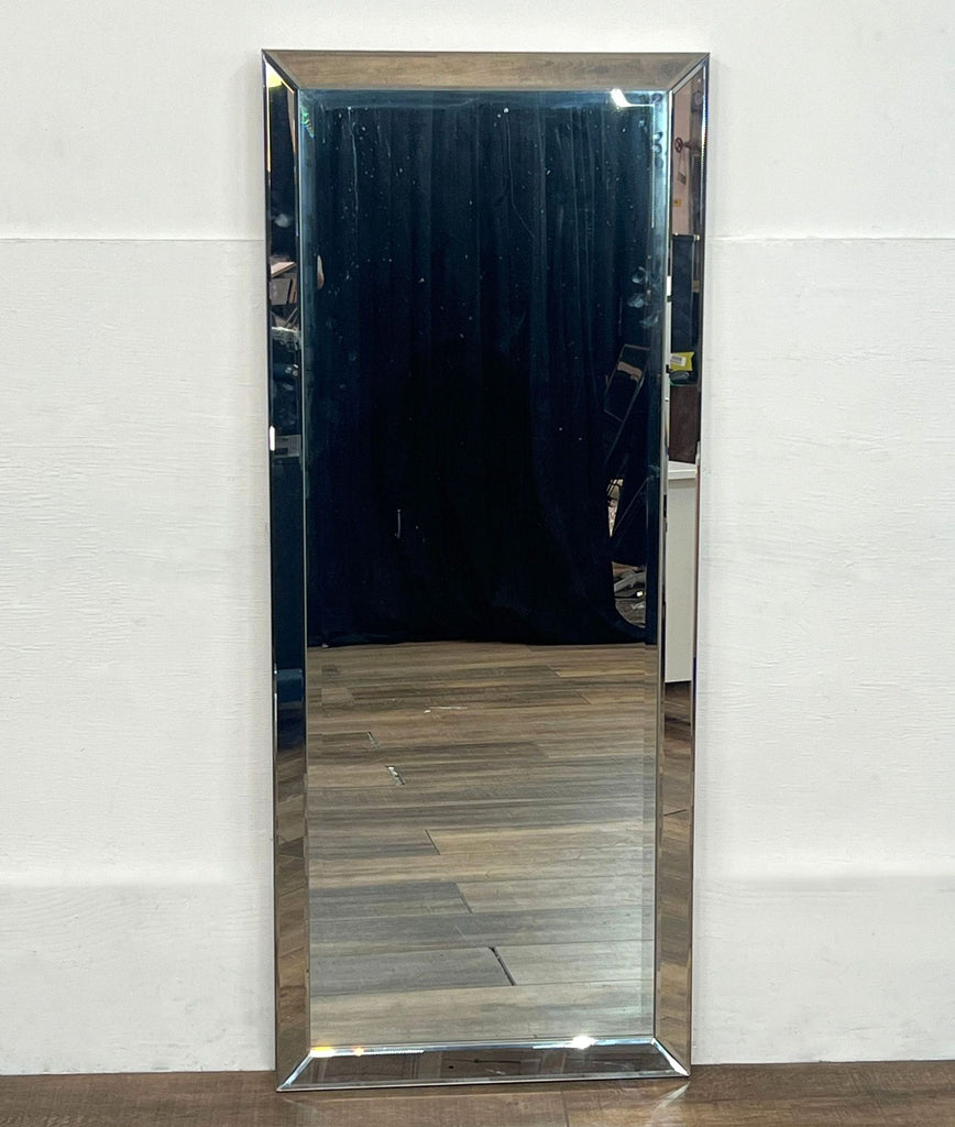 Full-length mirror with a beveled frame, designed to lean or mount with D-Rings.
