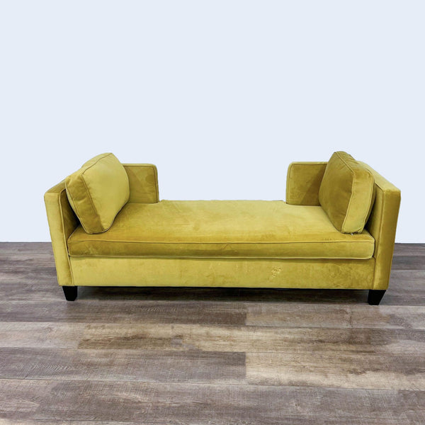 Velvet daybed with shelter arms, bolster pillows, and dark feet by Reperch.