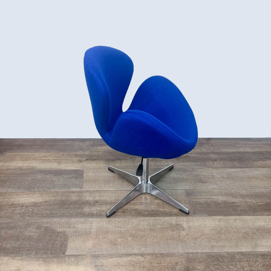 Contemporary chair on a single pedestal base, offering both comfort and minimalist style, adjustable in height.