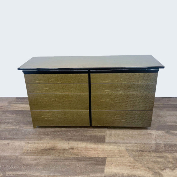 Modern dresser with burl wood veneer, 8 drawers, and metal glides.