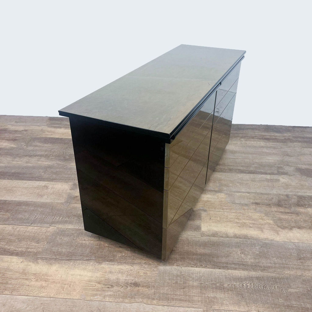 Sleek dresser with burl wood finish by Reperch, side view.