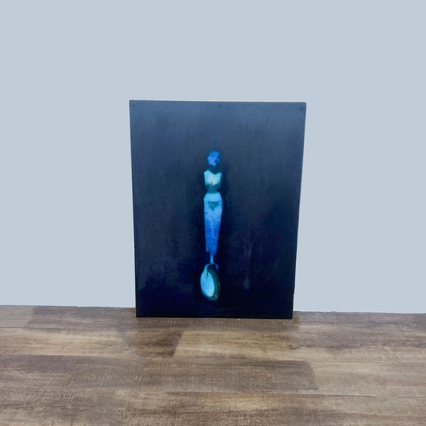 Painting "Jonah Wheel" by artist Todd Murphy, featuring a figurative design on a dark canvas.