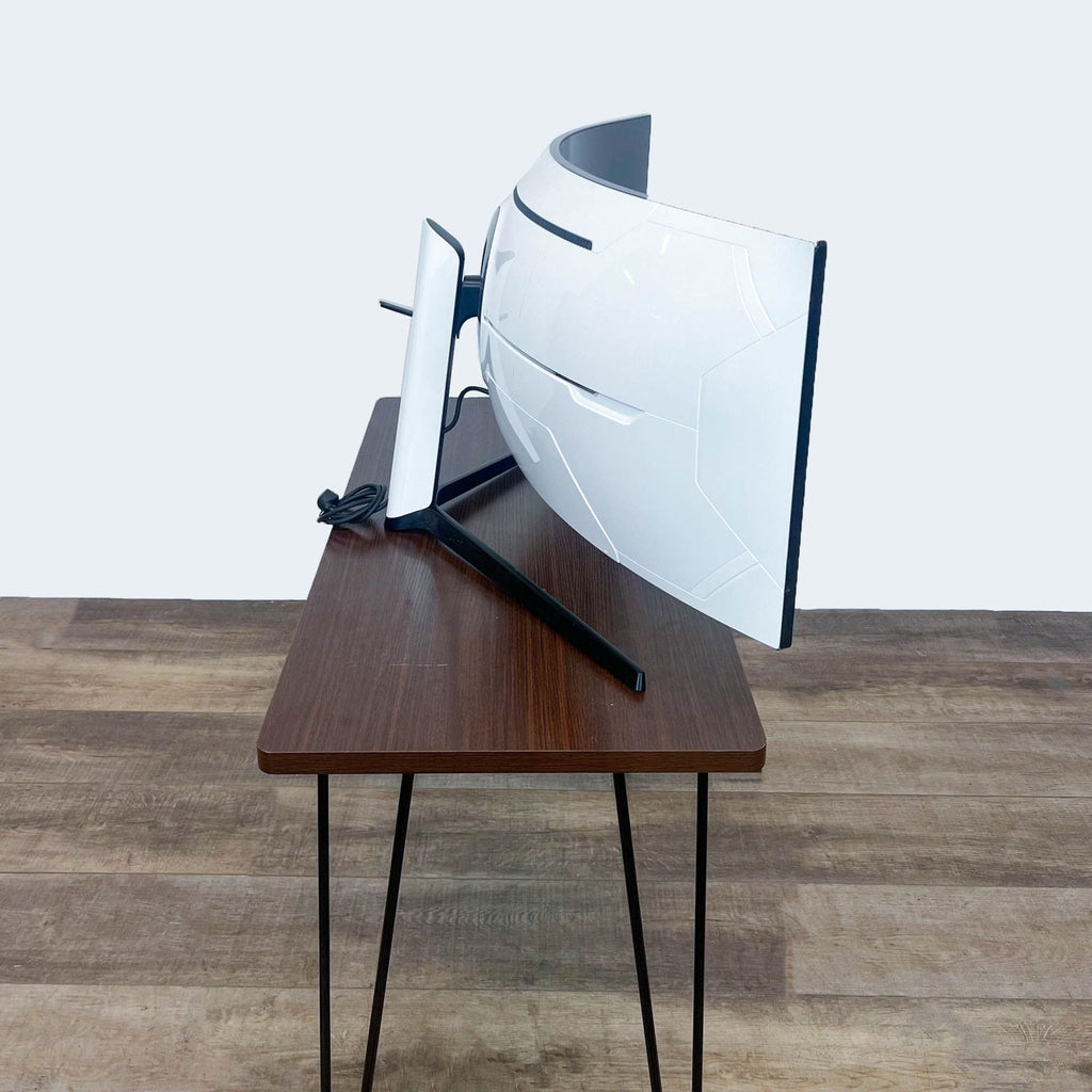 Back view of white Samsung Odyssey G9 Monitor with a sleek, futuristic design.