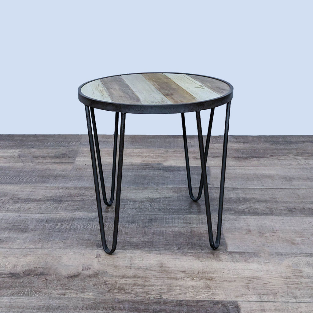 Round end table by Reperch featuring metal hairpin legs and a rustic wood finish.