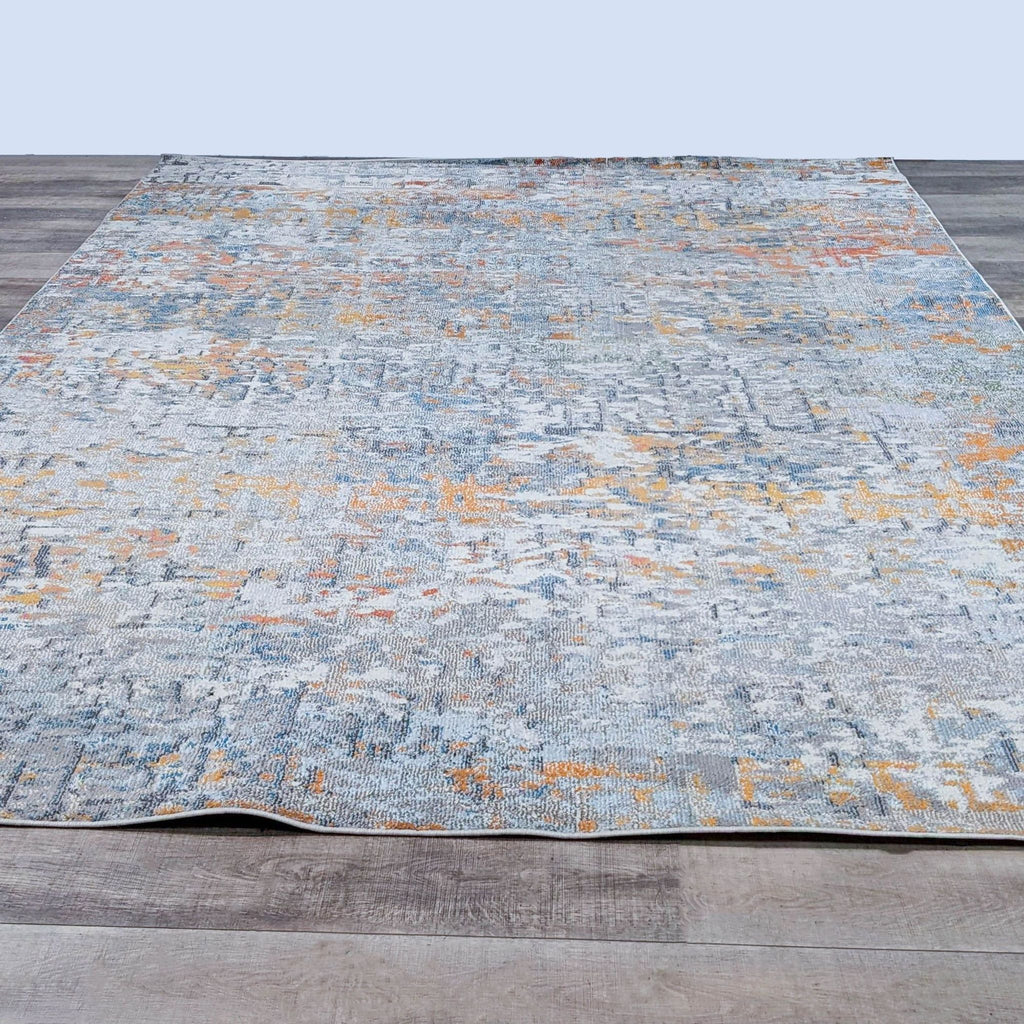 Rug showcasing contemporary design with medallions and floral patterns in rich, muted tones.