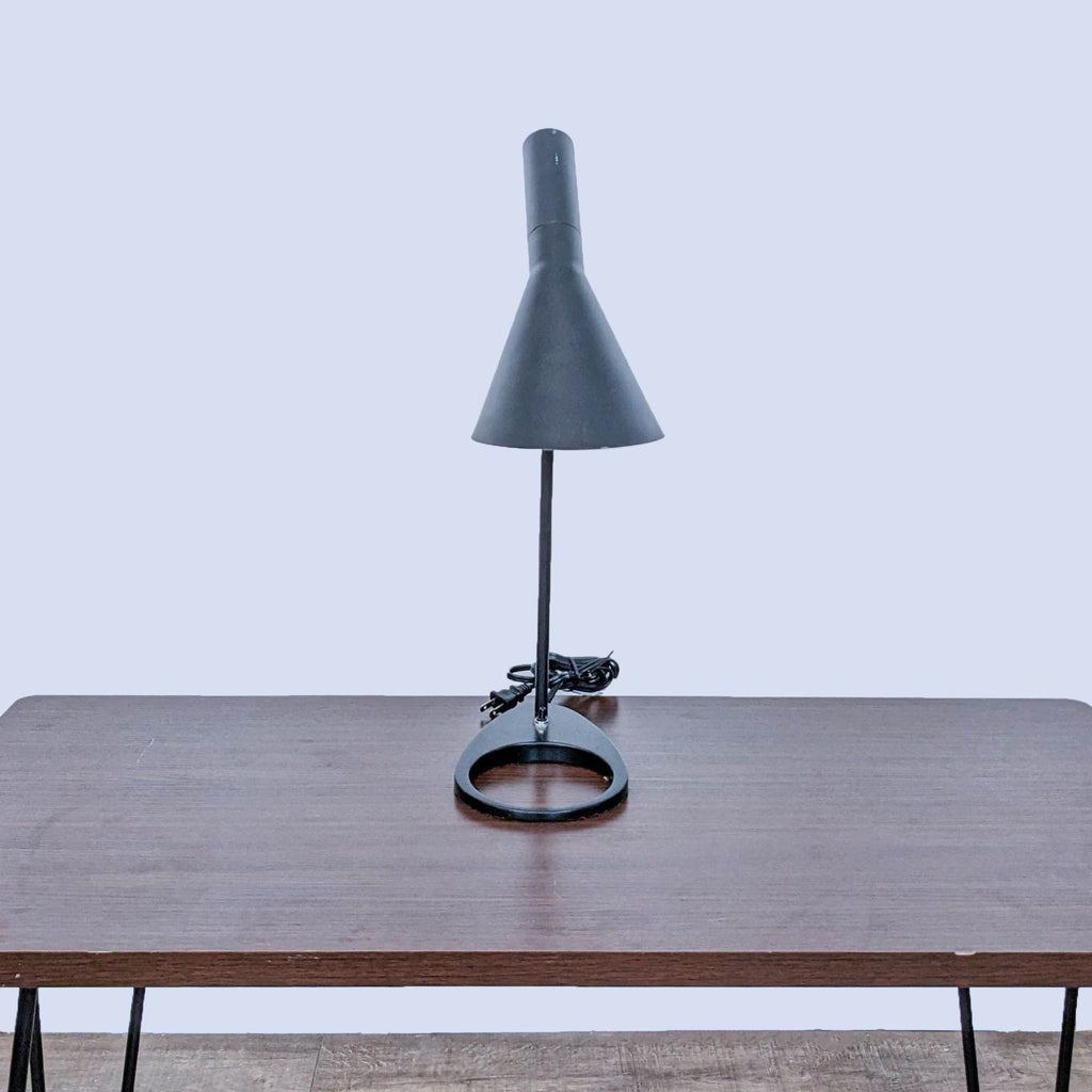 Reperch modern desk lamp with a conical shade and sleek black finish, perfect for contemporary decor.