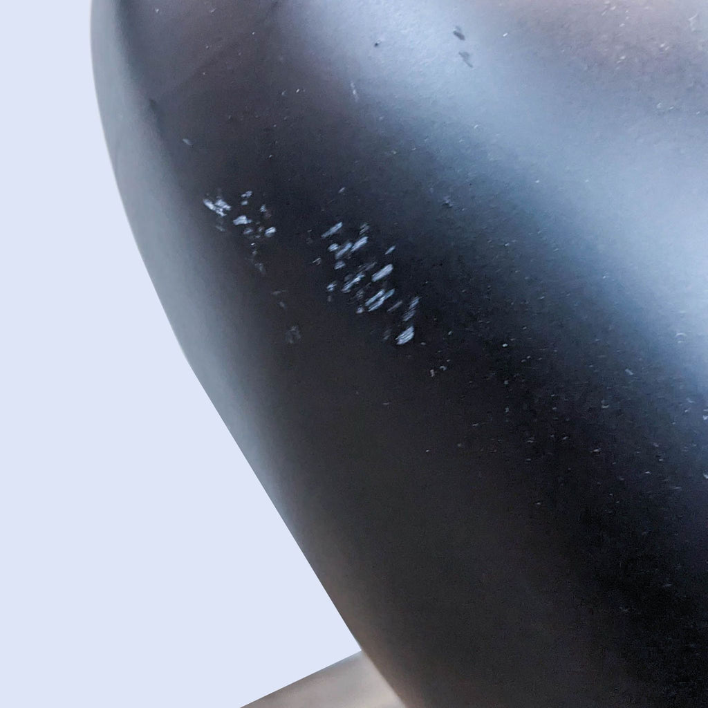 Close-up of the Reperch lamp, showing surface details and texture.