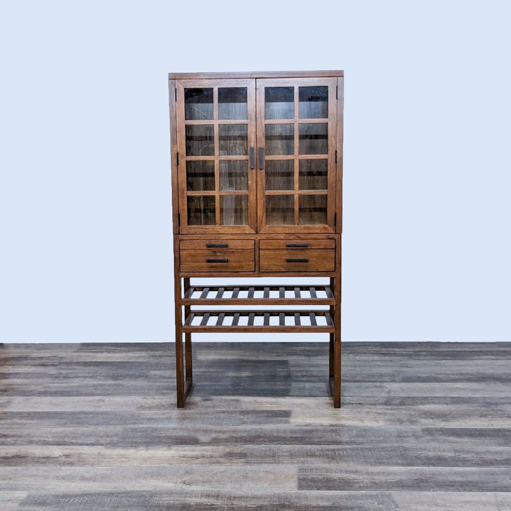 Reperch cabinet with glass doors, two drawers, and two shelves; inside shelves missing.