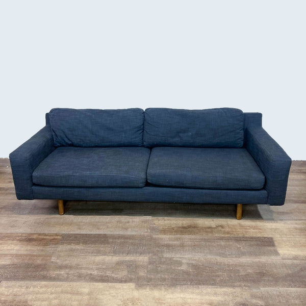 Modern 3-seat sofa with clean lines and wooden feet.