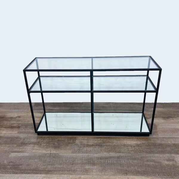 Glass and mirrored shelf table with metal frame, viewed from the front.
