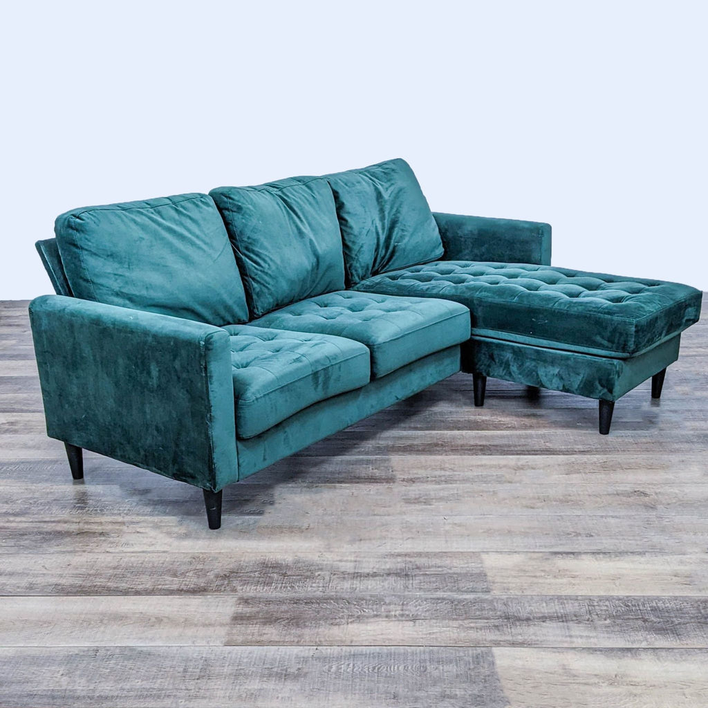 Modern green sectional sofa with tufted design, ideal for sleeping or lounging.