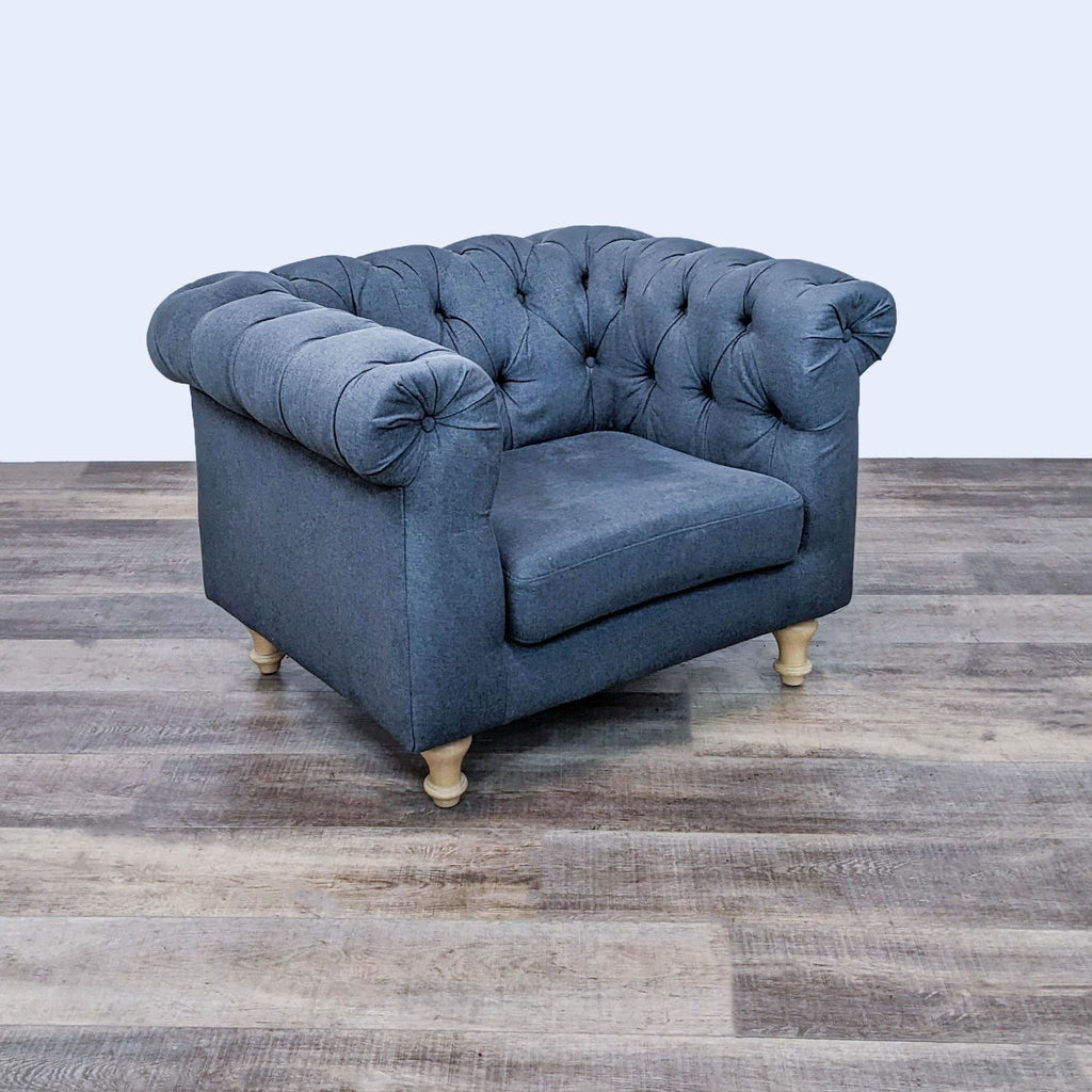Elegant lounge chair featuring button tufting and rolled arms, by World Market.