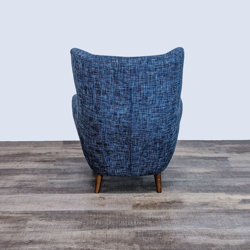 Back view of the Article's Mod chair highlighting its curved design and mid-century modern style.