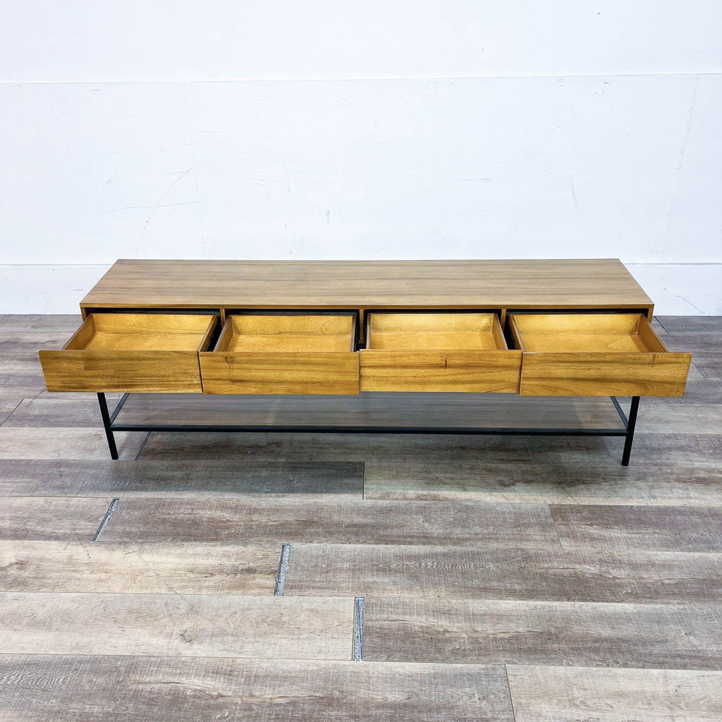 Four-drawer sideboard with a metal base and open shelf for display.  