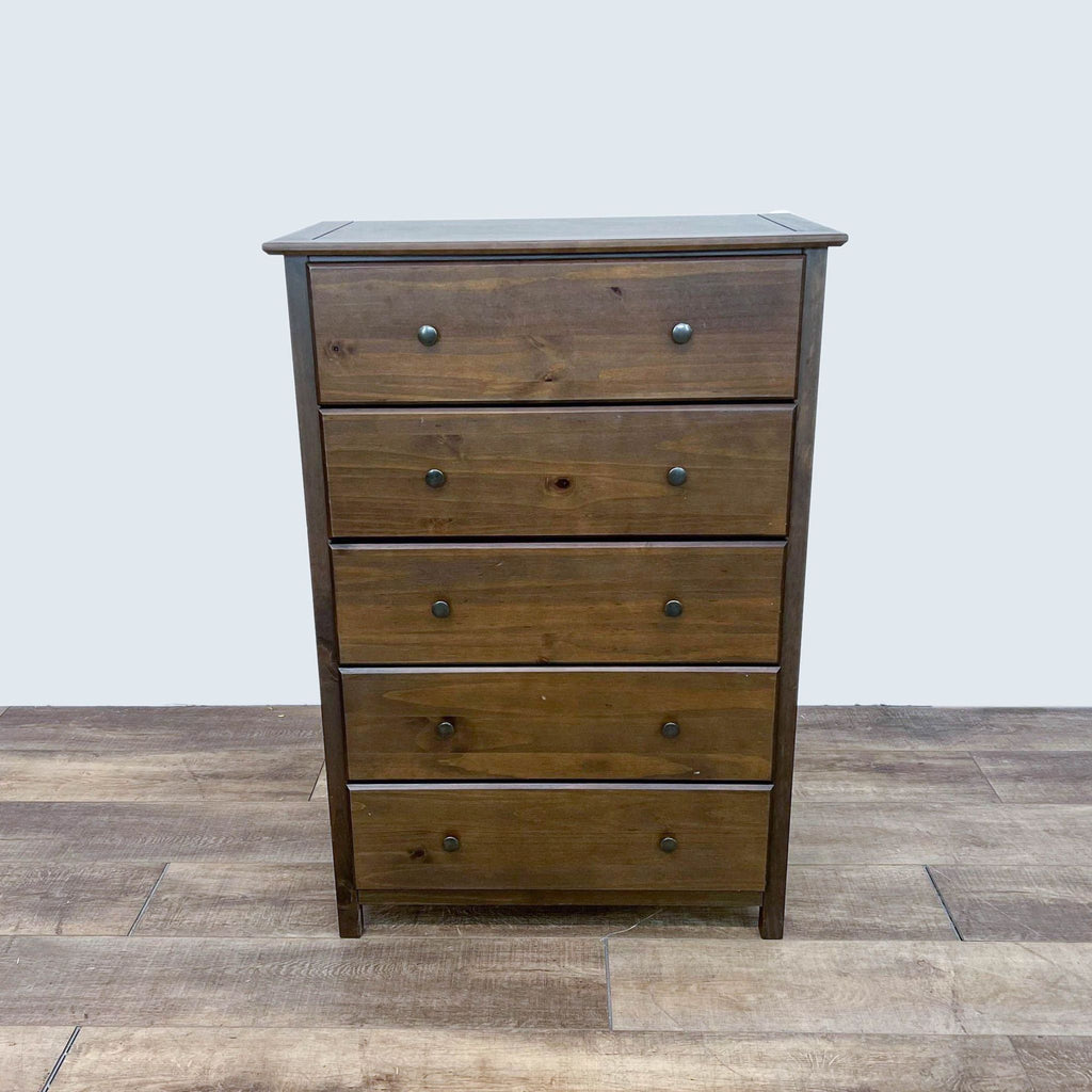 Shaker 5-drawer chest by Grain Wood Furniture in a cherry finish with metal knobs.