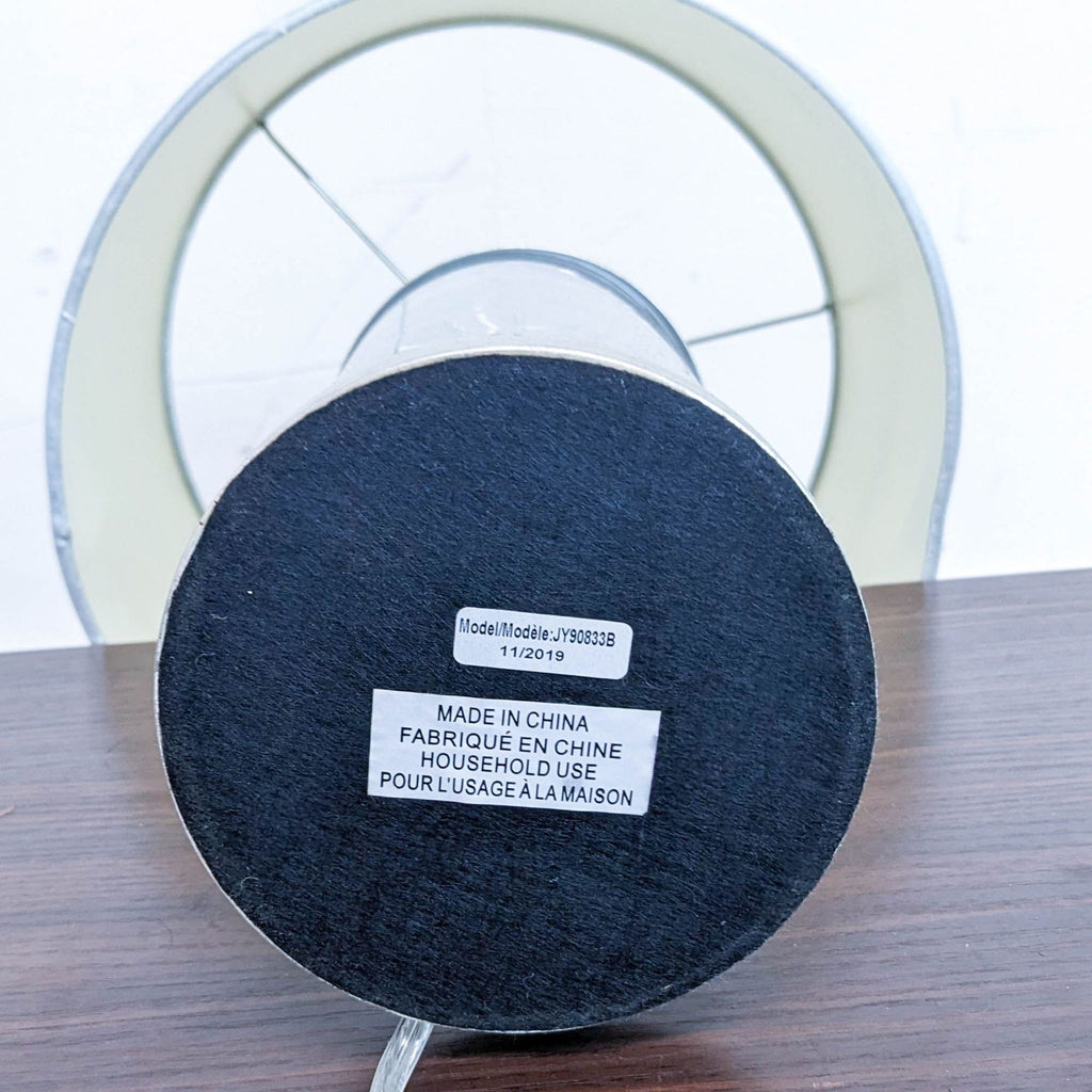 Bottom view of Reperch lamp base with model details for household use.