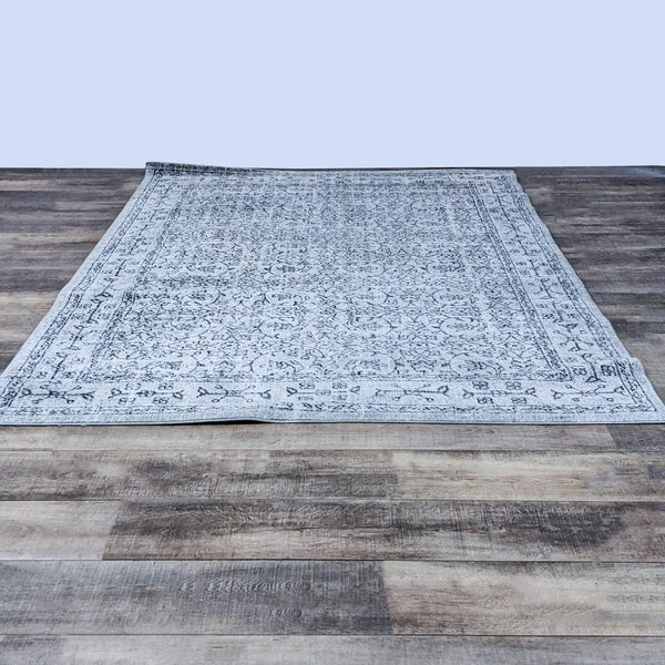Vintage-style 6'7" x 9' rug by nuLOOM in gray, with Oriental pattern, made in Turkey.