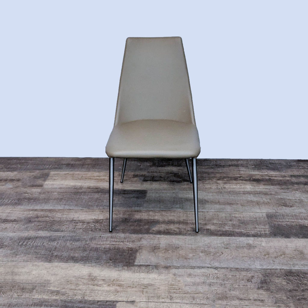 Front view of Whisp dining chair in leatherette with chrome legs by Zuo Modern.