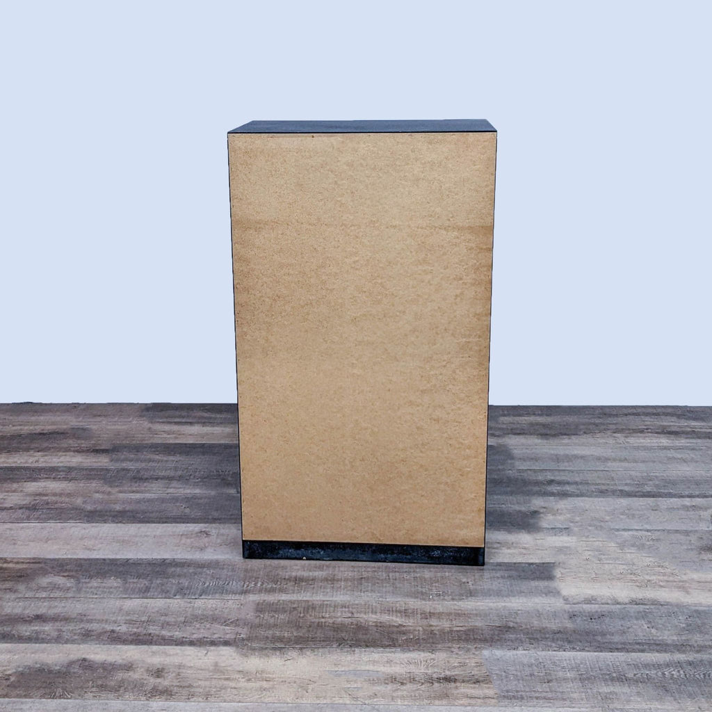 Back view of Reperch dresser displaying the plain wood panel.