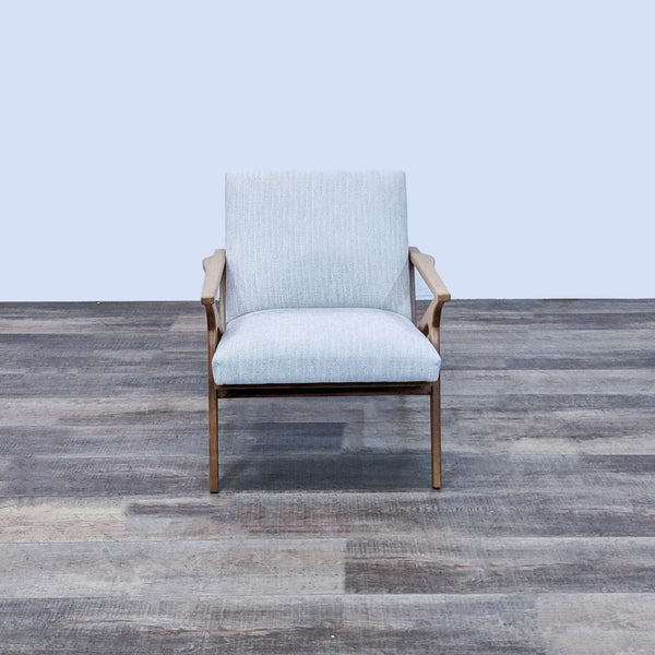 Crate & Barrel's Cavett lounge chair in solid walnut with textural weave upholstery, front view.