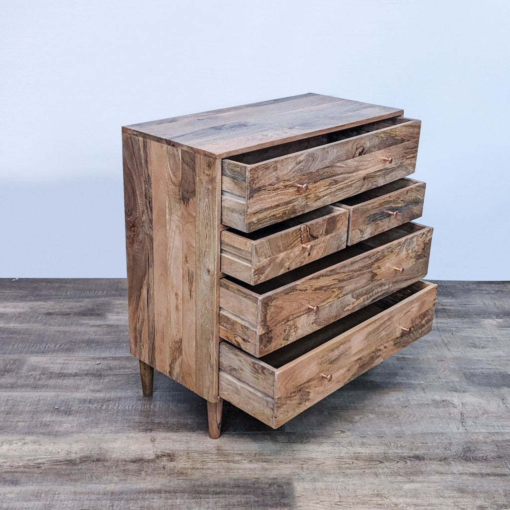 Side angle of the open Reagan dresser, highlighting the natural wood grain and tapered legs.