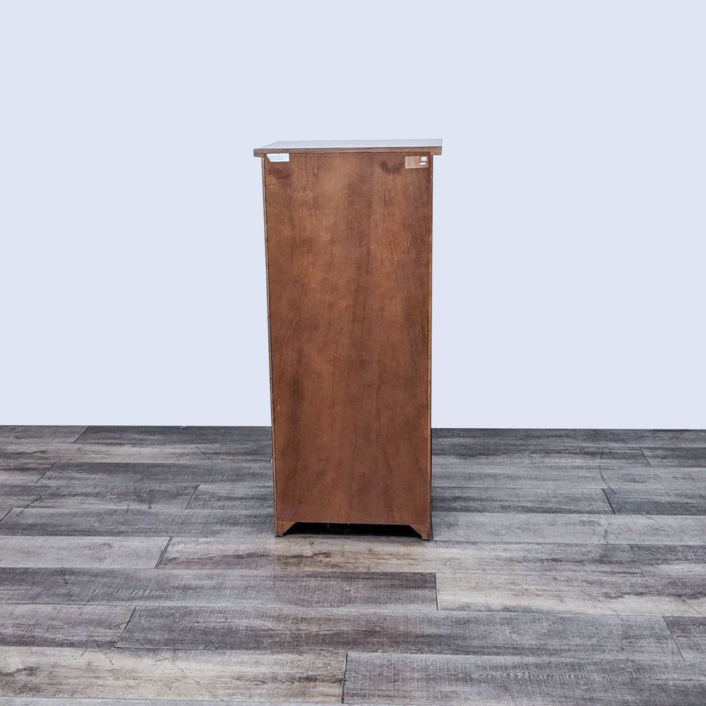 Back view of wooden lingerie chest with solid construction, no handles visible.