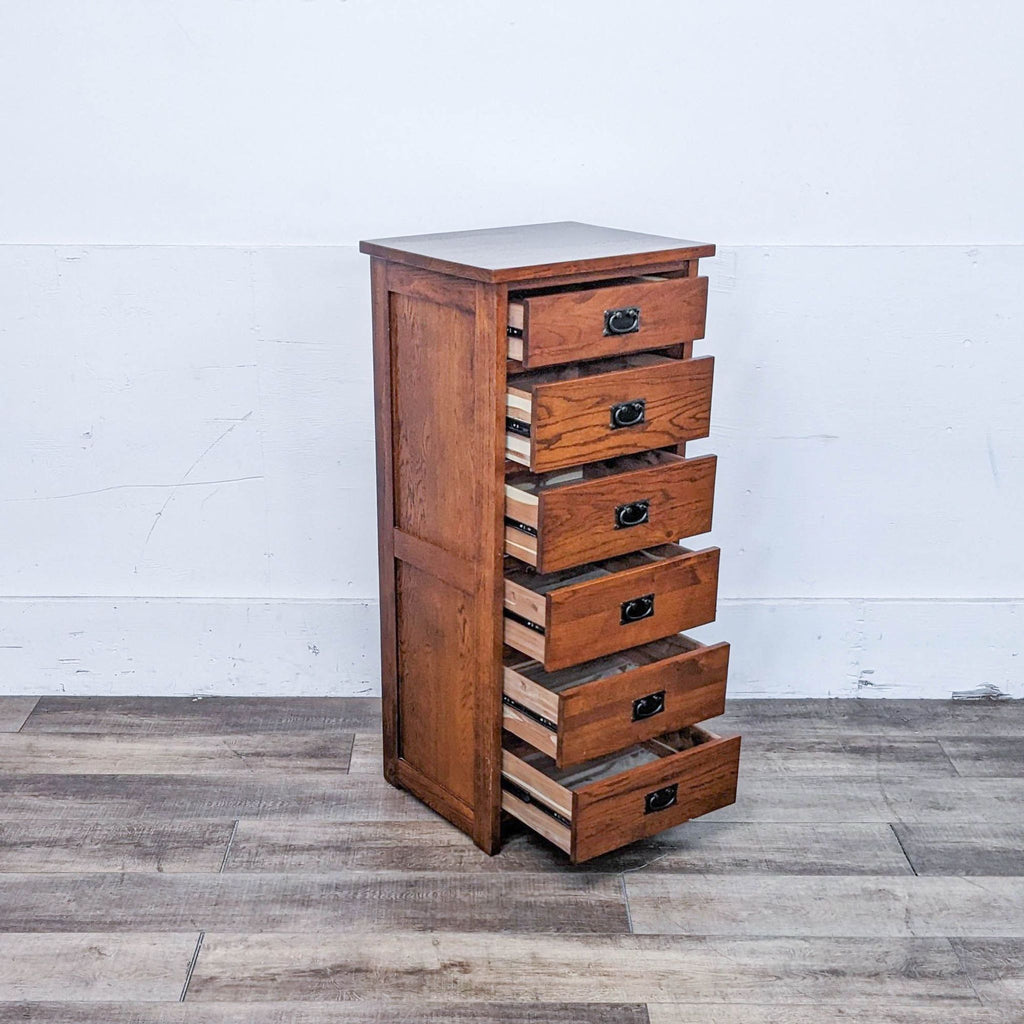 Side view of six-drawer lingerie chest, drawers open showing metal glides.