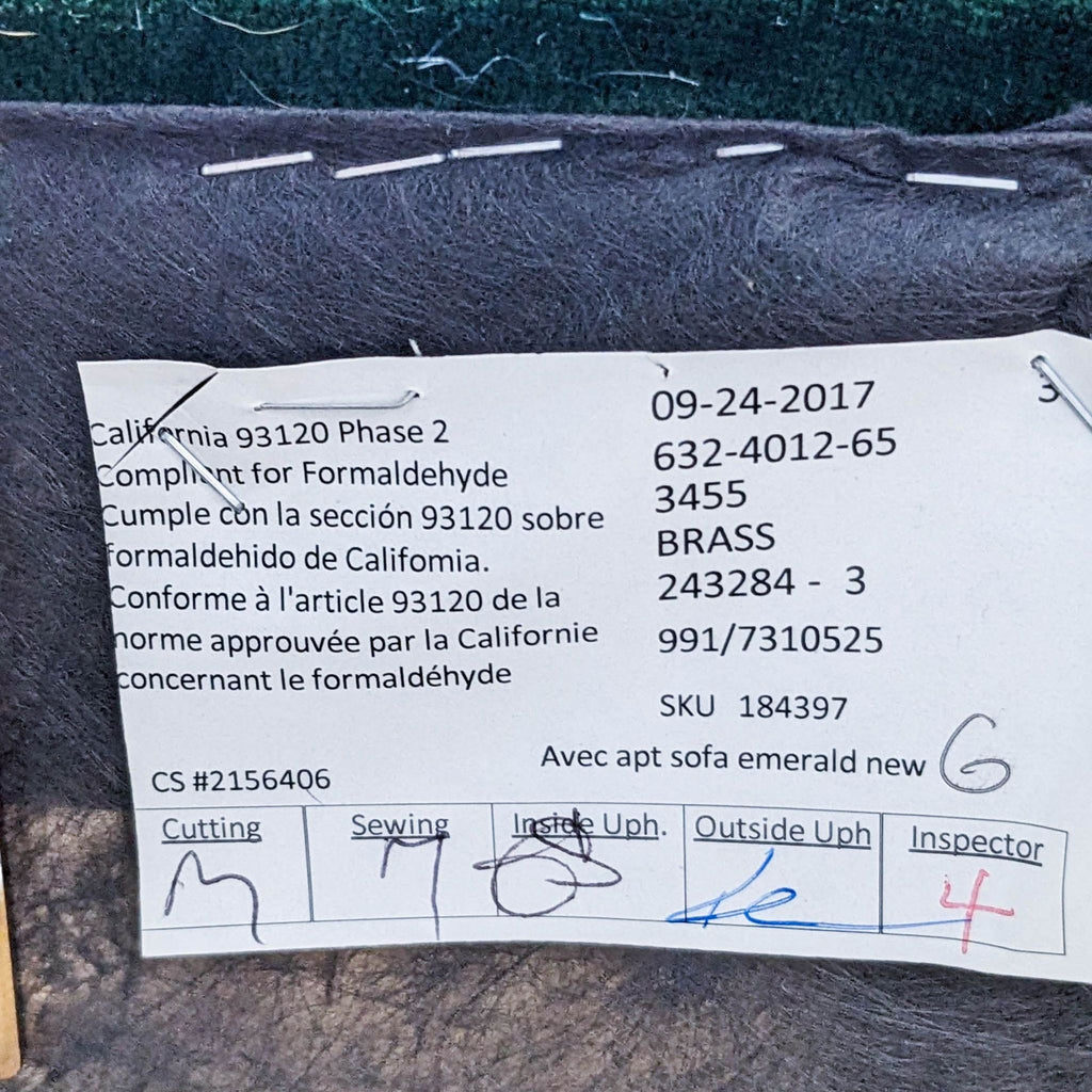 Close-up of a label detailing product specifications for a loveseat.