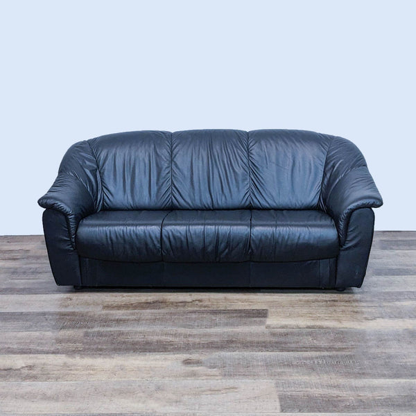 Black leather 3-seat sofa with high back and pillow top arms by Reperch.