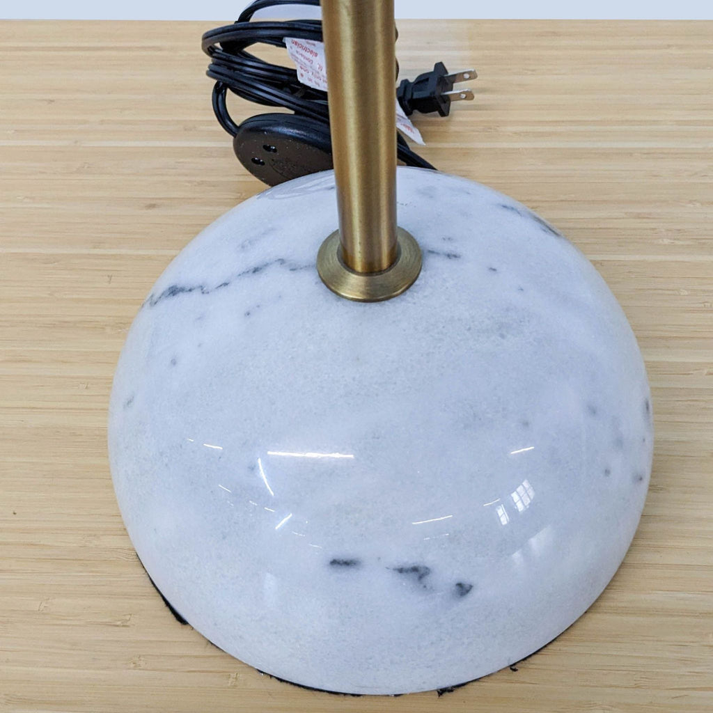 Close-up of the Reperch lamp's sturdy marble base.