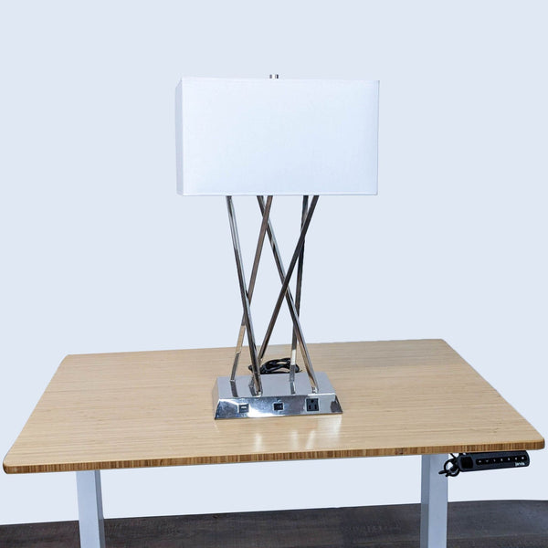 Reperch lamp with USB and power outlet on wooden table.