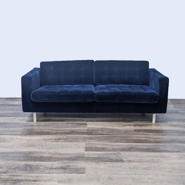 Dark navy tufted 3-seat sofa with narrow arms, light finish feet.