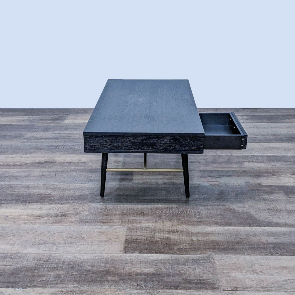 Sleek coffee table by Reperch, showcasing a partially open drawer and modern design.