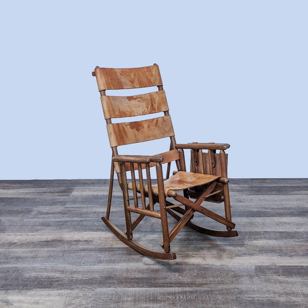 Costa Rican mid-century folding rocking chair with leather seat and side pouch.