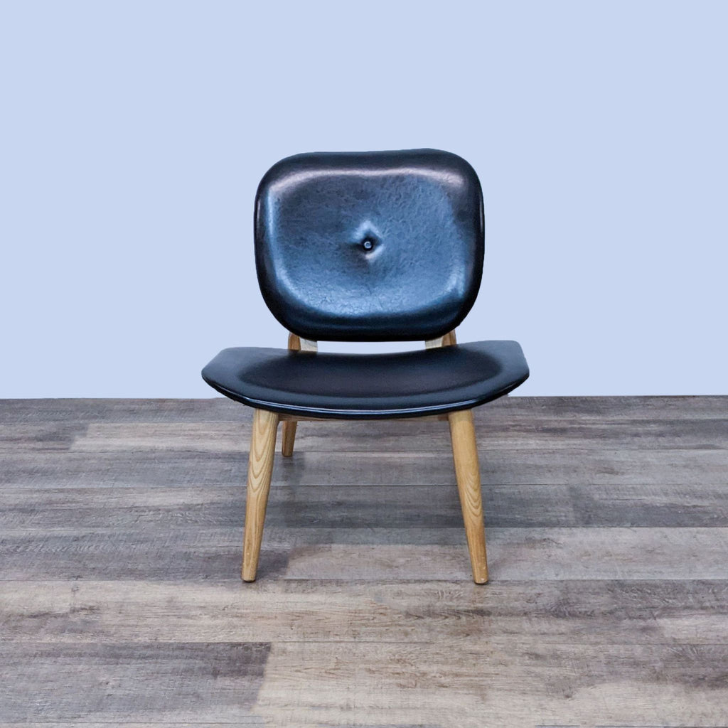 Mid-Century dining chair with faux leather and tapered wood legs, by Reperch in the Lounge category.